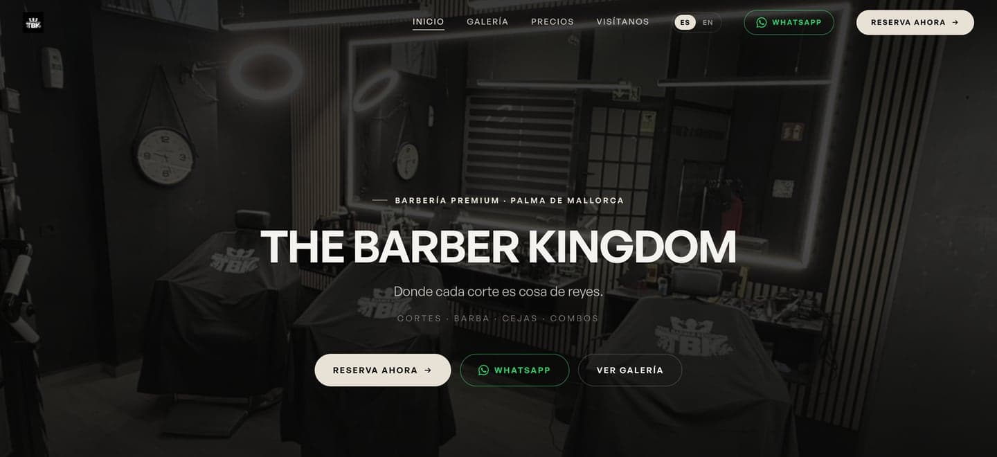Homepage of The Barber Kingdom website, showing the shop's name over a photograph of the barber chairs, with buttons to book, write on WhatsApp and see the gallery